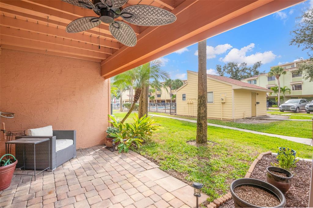 529 Sandy Hook Road Treasure Island, FL 33706 - Photo 40 of 55 a view of a porch with furniture and garden