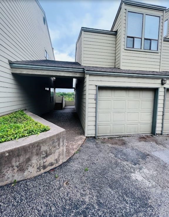 2612 San Pedro Street, Unit 116 Austin, TX 78705 - Photo 1 of 20 a front view of a house with garden