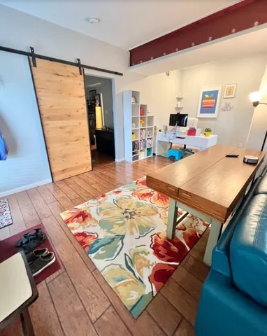a view of a living room and dining room