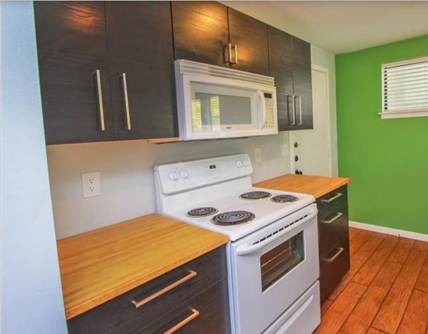 2612 San Pedro Street, Unit 116 Austin, TX 78705 - Photo 10 of 20 a bathroom with a sink and a mirror