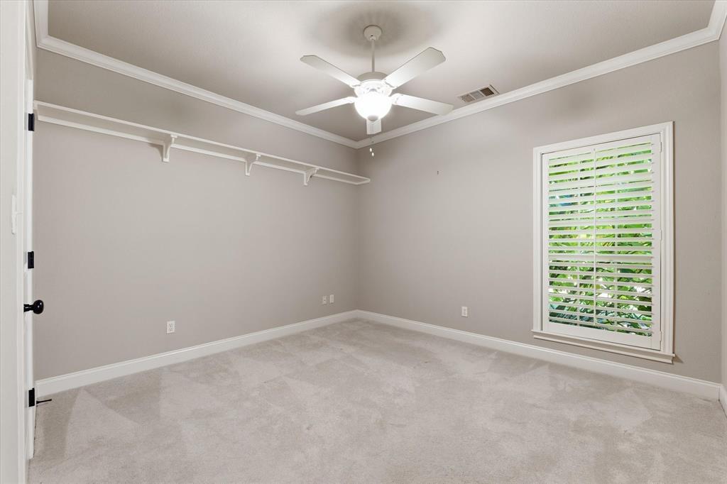 504 Casa Del Rancho Road Lorena, TX 76655 - Photo 20 of 40 Light gray wall paint complemented by white crown molding and baseboards
