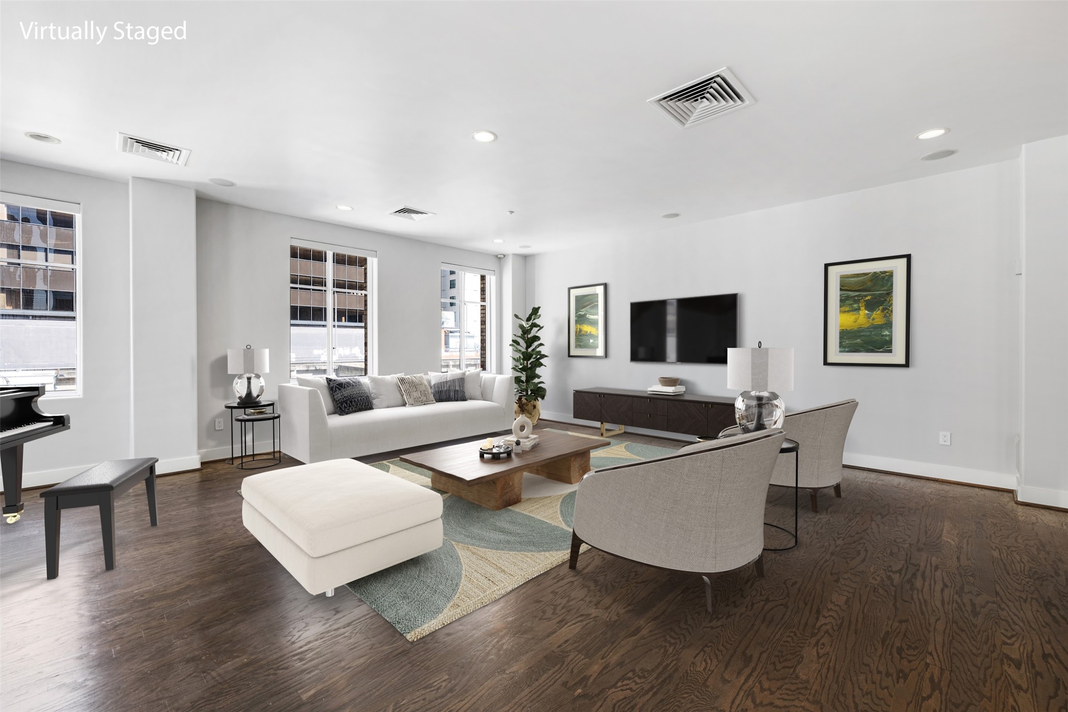 914 Main Street, Unit 1201 Houston, TX 77002 - Photo 11 of 36 a living room with furniture flat screen tv and wooden floor