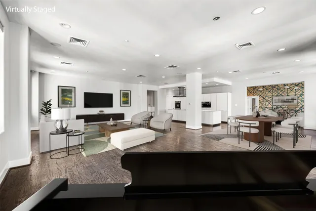 a living room with fireplace furniture and a flat screen tv