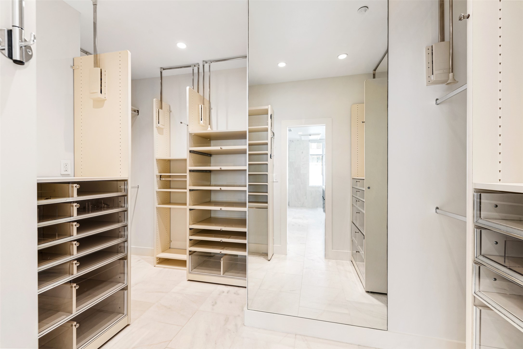 914 Main Street, Unit 1201 Houston, TX 77002 - Photo 25 of 36 a view of walk in closet and kitchen with window