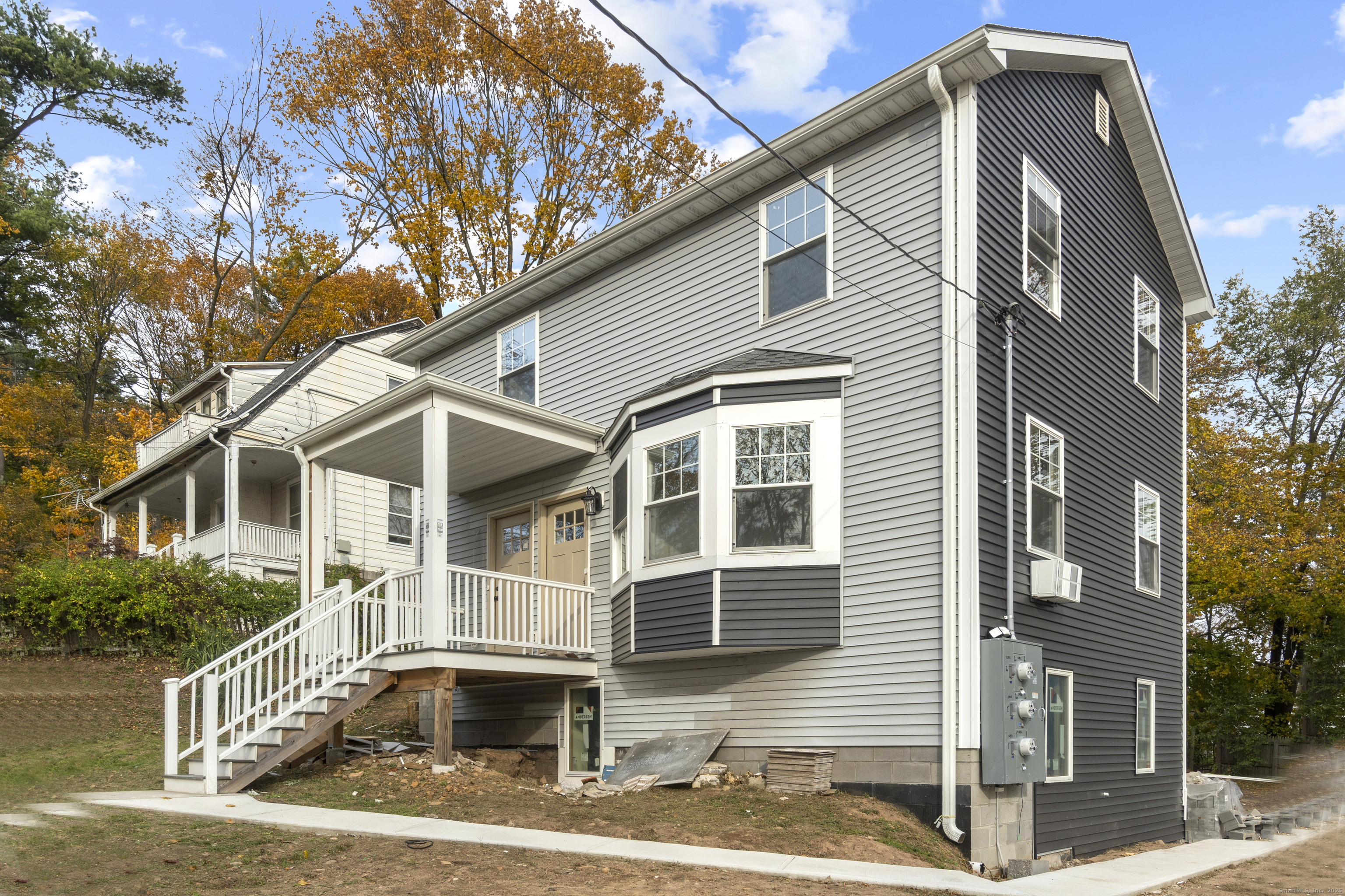 1285 Townsend Avenue, Unit 1 New Haven, CT 06513 - Photo 1 of 17 a front view of a house with street