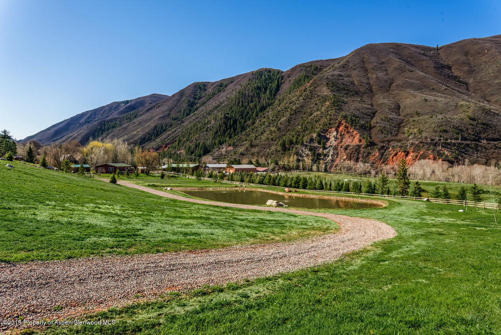 182 Hoaglund Ranch Road Basalt, CO 81621 - Photo 11 of 31 a view of a golf course with a garden
