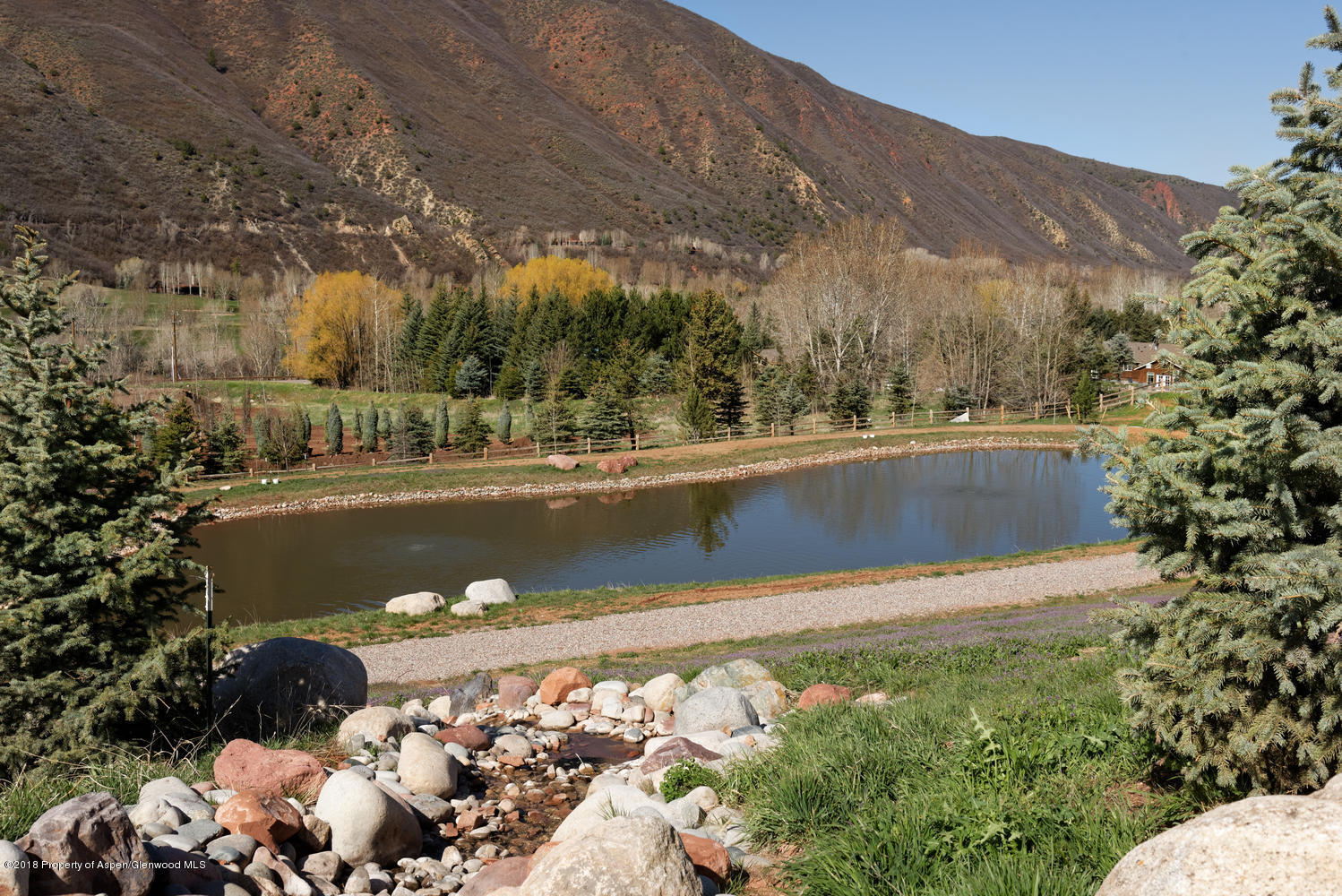 182 Hoaglund Ranch Road Basalt, CO 81621 - Photo 19 of 31 a view of a lake with a mountain