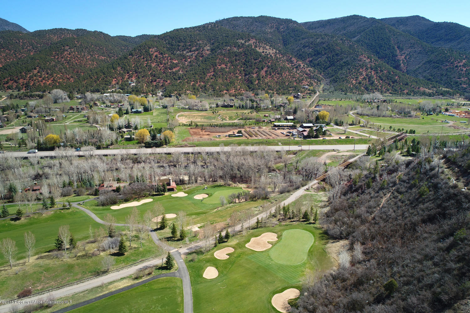 182 Hoaglund Ranch Road Basalt, CO 81621 - Photo 20 of 31 a view of a lush green hillside and houses