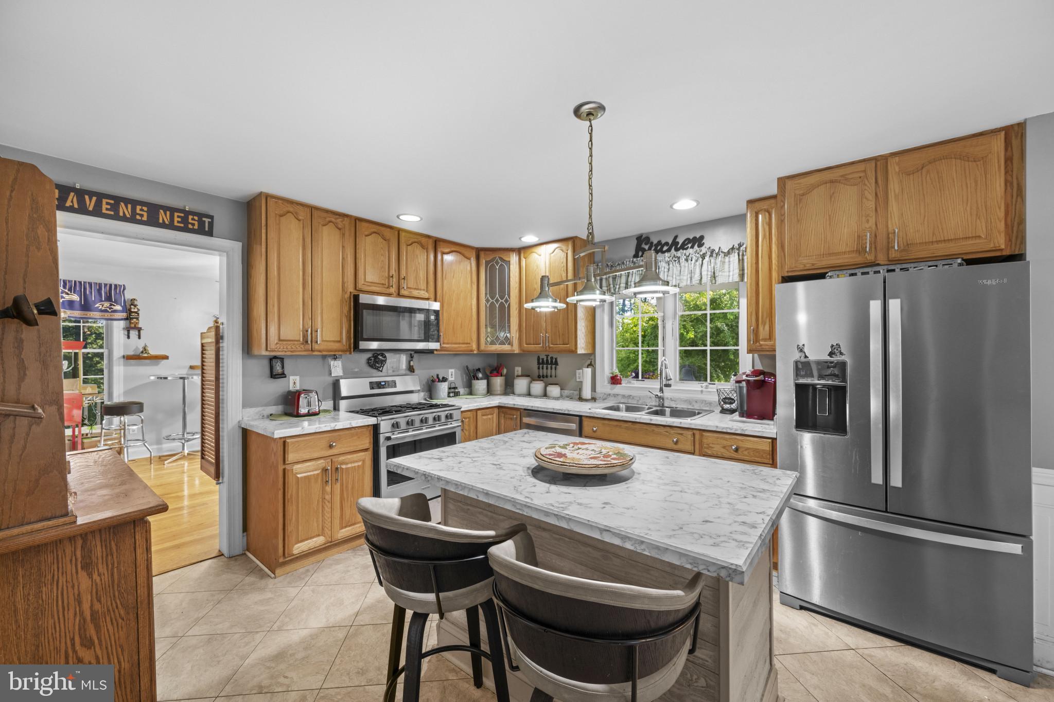 194 Cook Road Delta, PA 17314 - Photo 13 of 35 a kitchen with refrigerator a stove and furniture