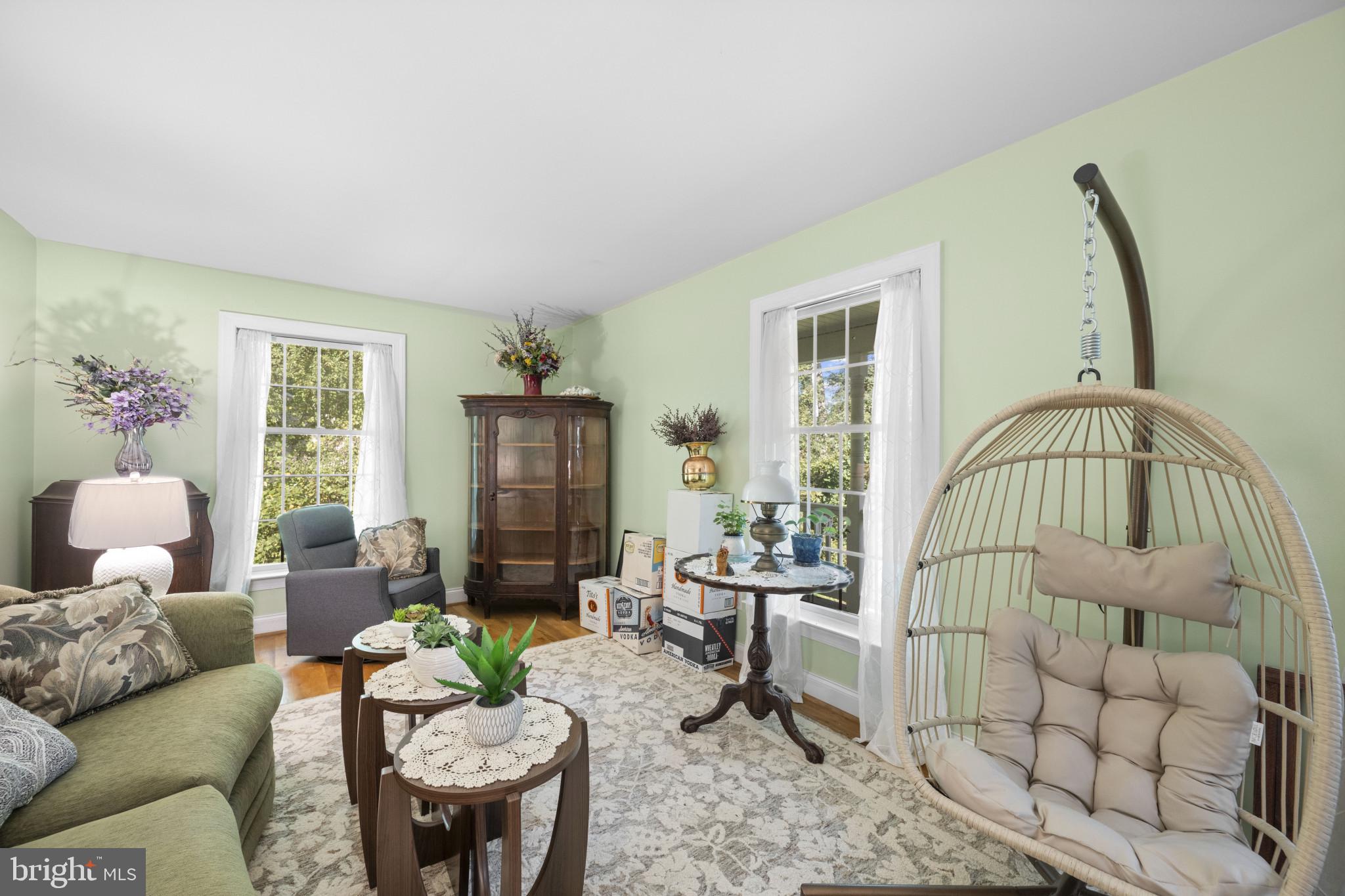 194 Cook Road Delta, PA 17314 - Photo 19 of 35 a living room with furniture flowerpot and a window