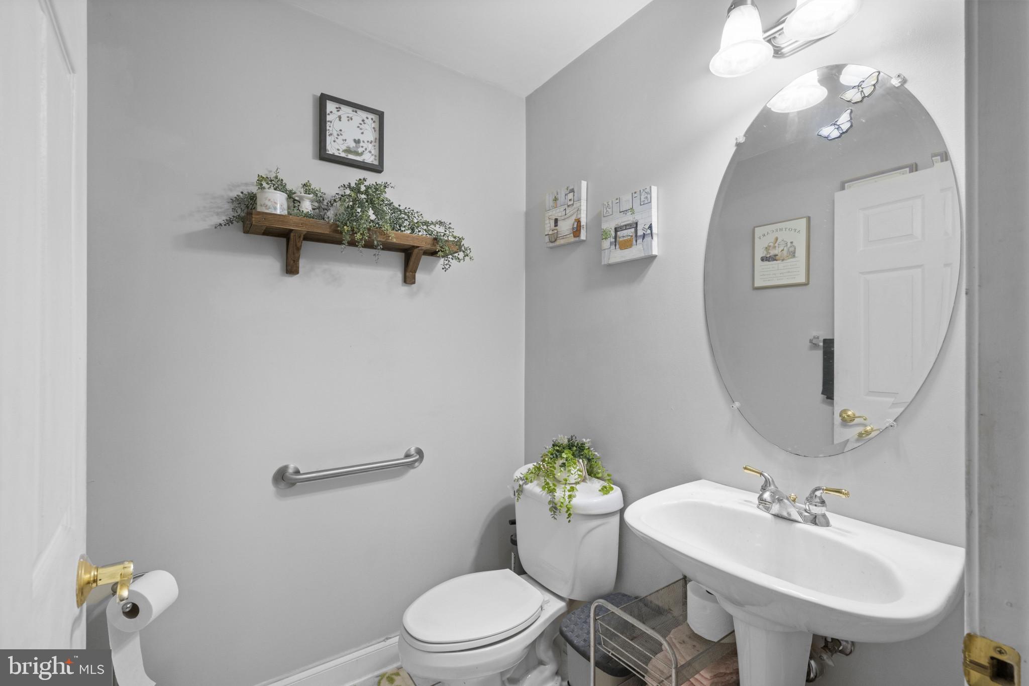 194 Cook Road Delta, PA 17314 - Photo 21 of 35 a bathroom with a toilet sink and mirror