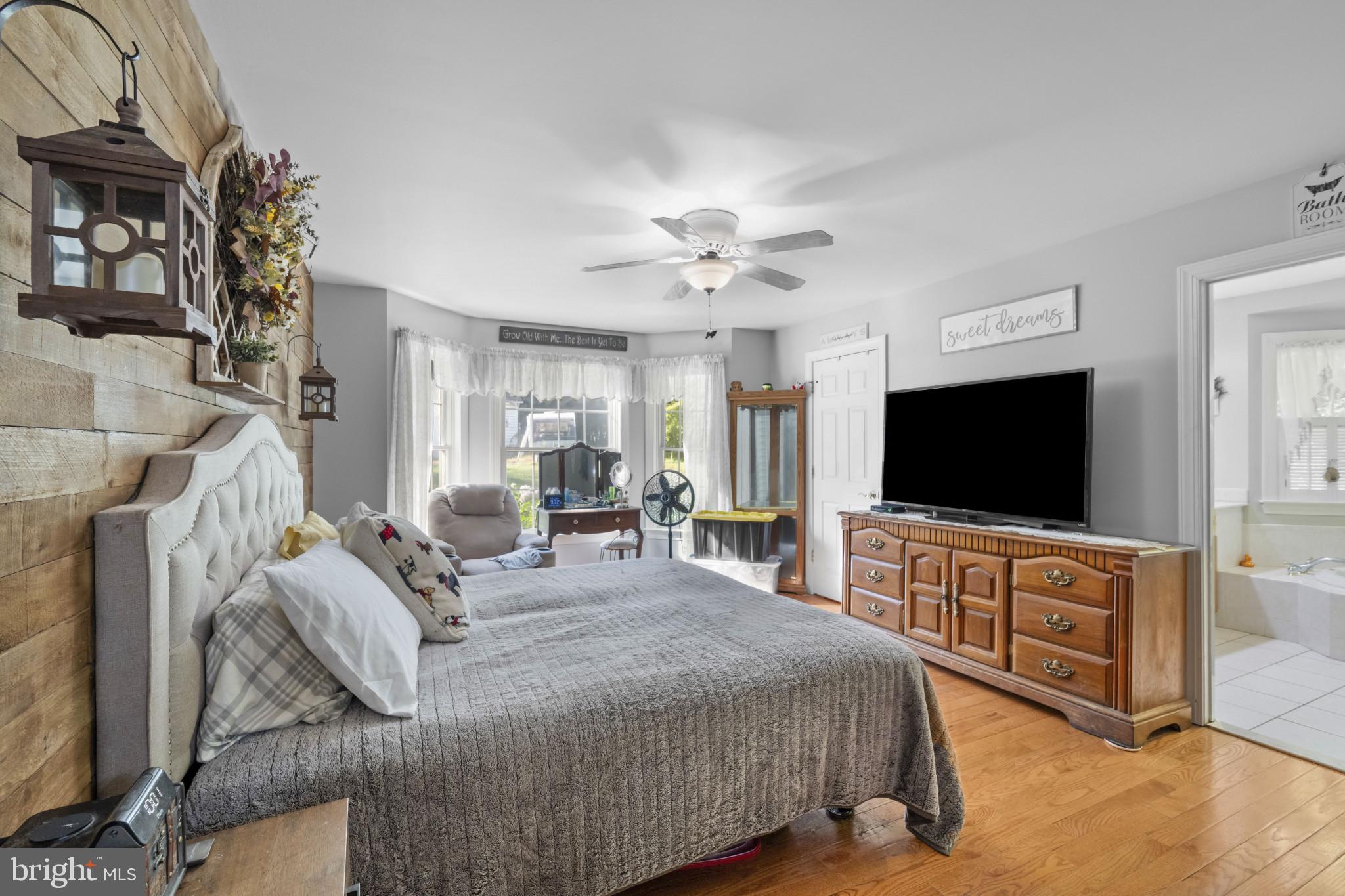 194 Cook Road Delta, PA 17314 - Photo 22 of 35 a bedroom with furniture and a flat screen tv