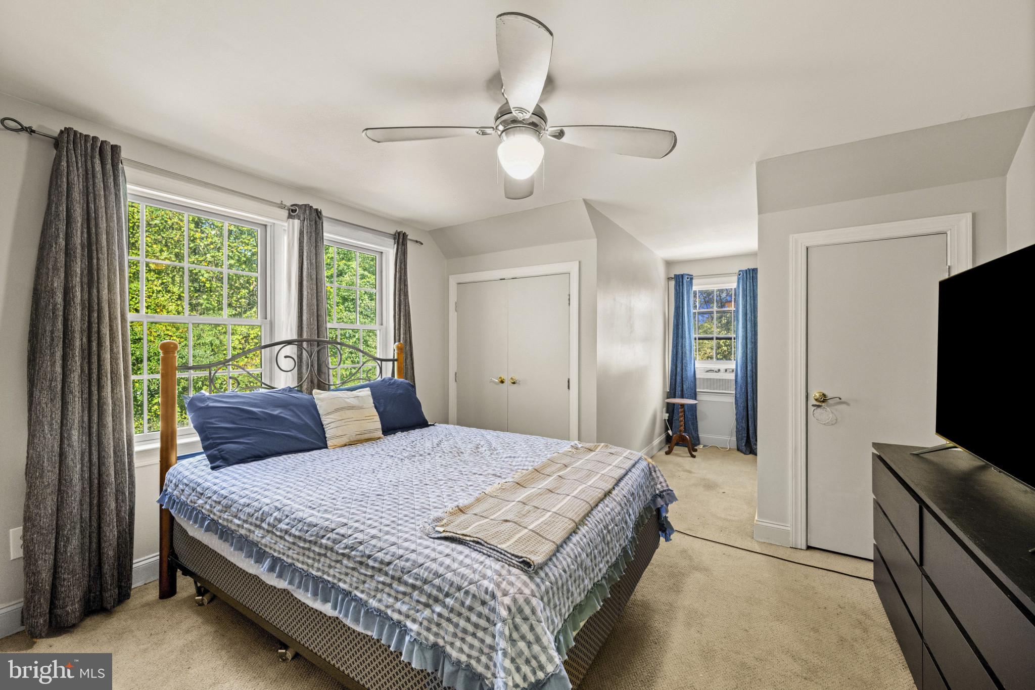 194 Cook Road Delta, PA 17314 - Photo 27 of 35 a bedroom with a large bed and a flat tv screen