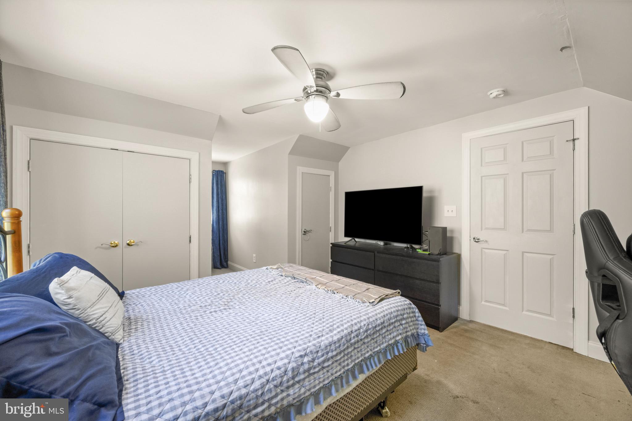 194 Cook Road Delta, PA 17314 - Photo 28 of 35 a bedroom with a bed and a flat screen tv