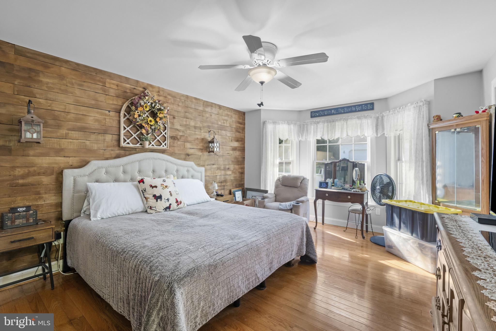 194 Cook Road Delta, PA 17314 - Photo 4 of 35 a bedroom with a bed and a table with chair