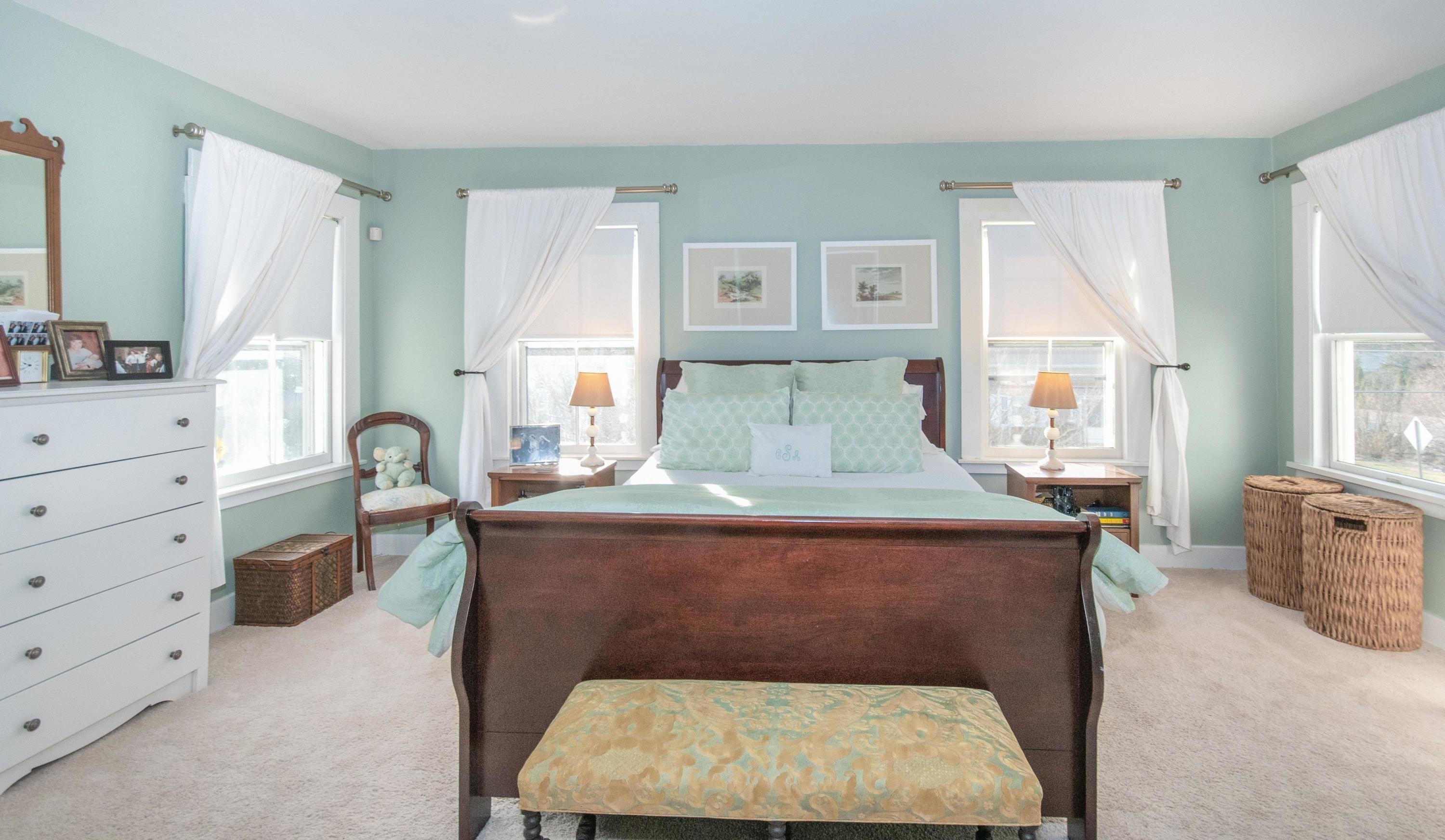 338 Flax Hill Road Norwalk, CT 06854 - Photo 15 of 26 a room with a bed and a dresser