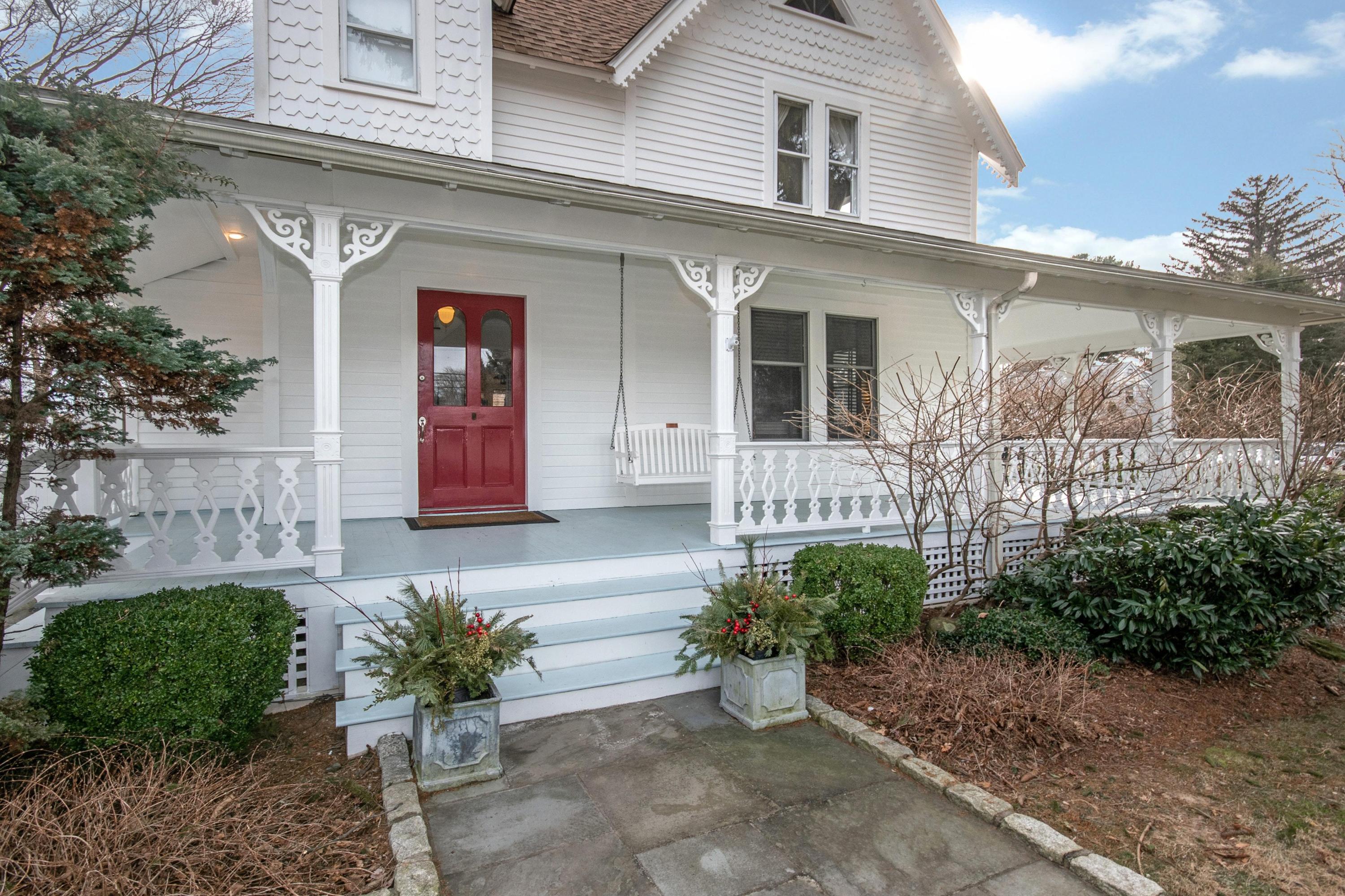 338 Flax Hill Road Norwalk, CT 06854 - Photo 2 of 26 a front view of a house with garden