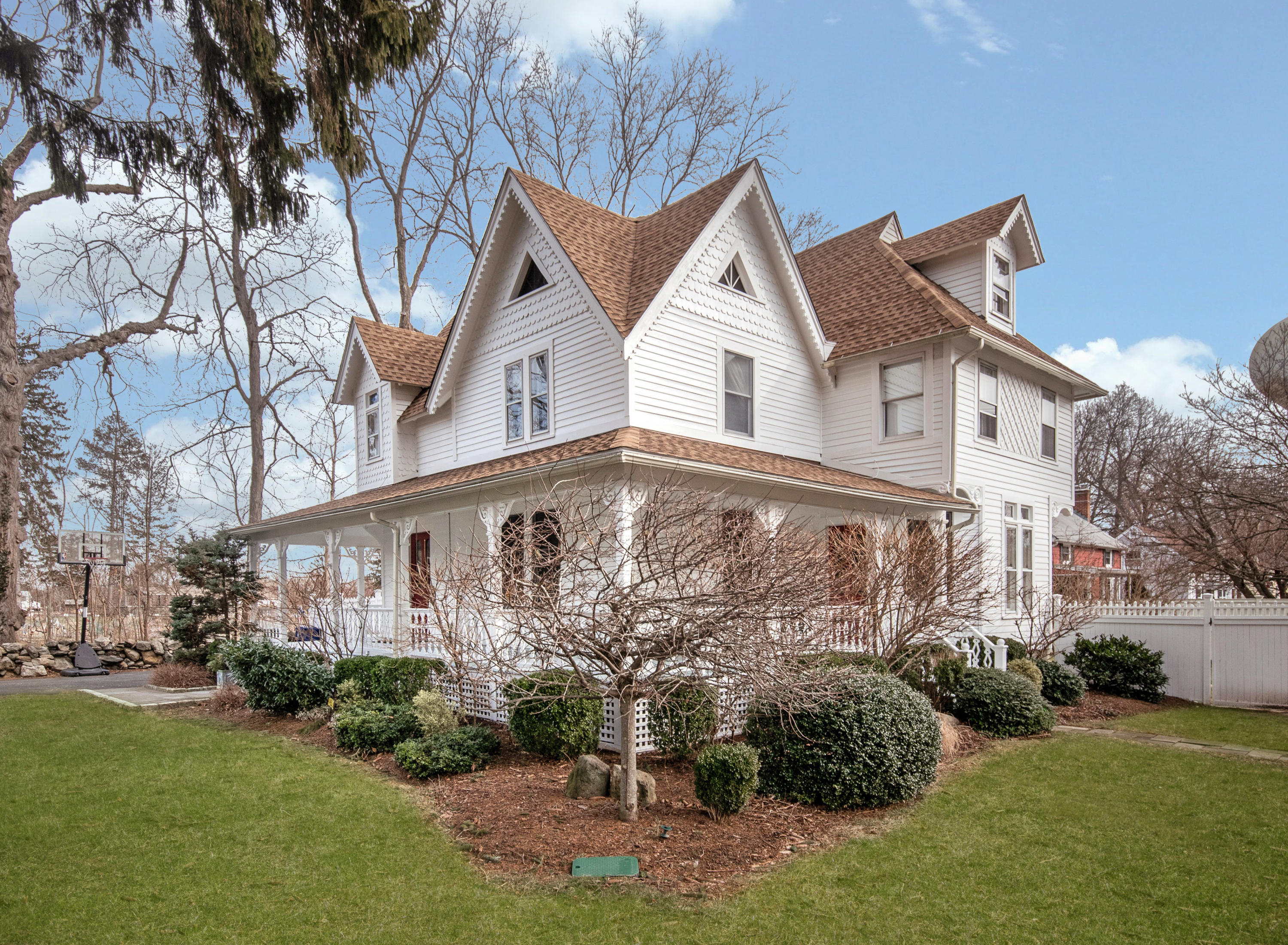 338 Flax Hill Road Norwalk, CT 06854 - Photo 25 of 26 a front view of a house with garden