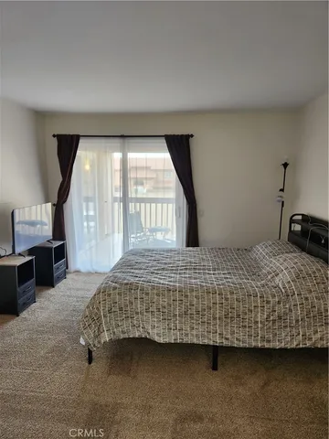 $355,000 | 4861 Lago Drive, Unit 206, Huntington Beach, CA 92649