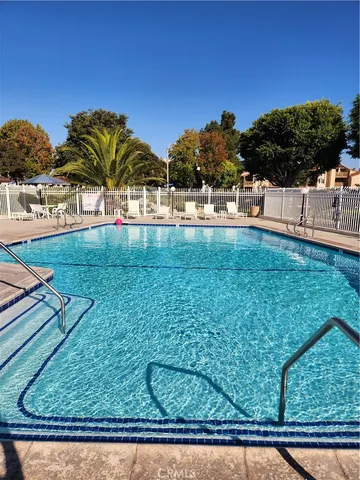$355,000 | 4861 Lago Drive, Unit 206, Huntington Beach, CA 92649