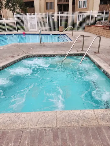 $355,000 | 4861 Lago Drive, Unit 206, Huntington Beach, CA 92649