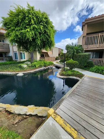 $355,000 | 4861 Lago Drive, Unit 206, Huntington Beach, CA 92649