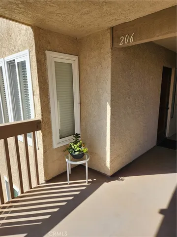 $355,000 | 4861 Lago Drive, Unit 206, Huntington Beach, CA 92649