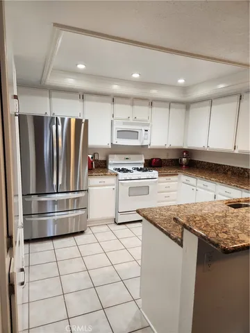 $355,000 | 4861 Lago Drive, Unit 206, Huntington Beach, CA 92649