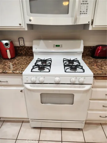 $355,000 | 4861 Lago Drive, Unit 206, Huntington Beach, CA 92649