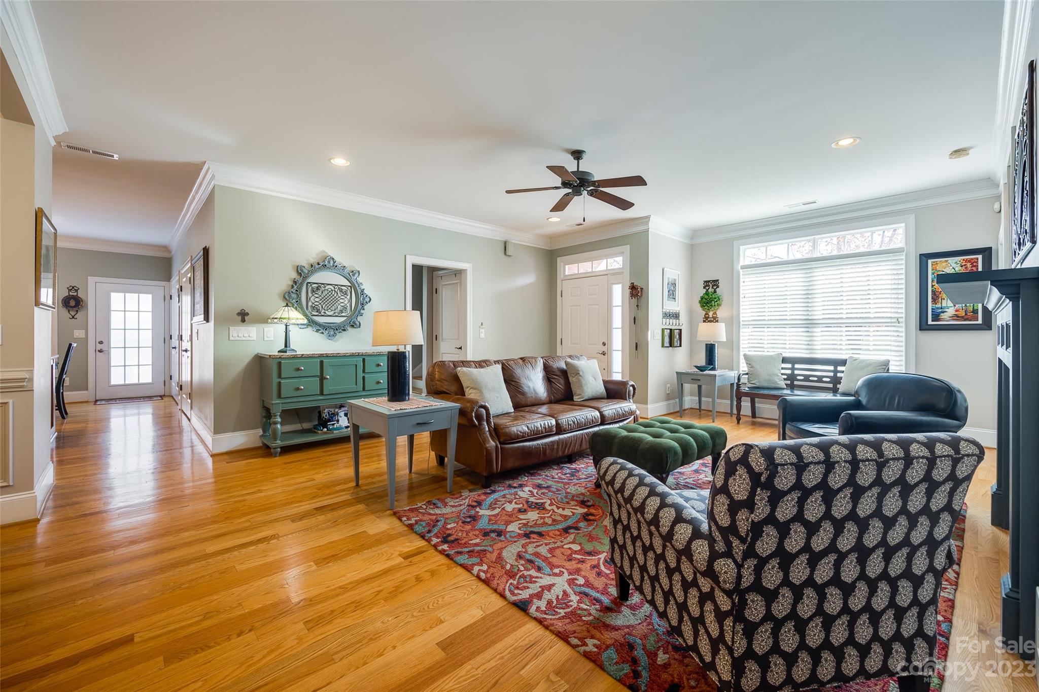 502 Whistling Straits Lane Fort Mill, SC 29708 - Photo 5 of 37 a living room with furniture and a wooden floor
