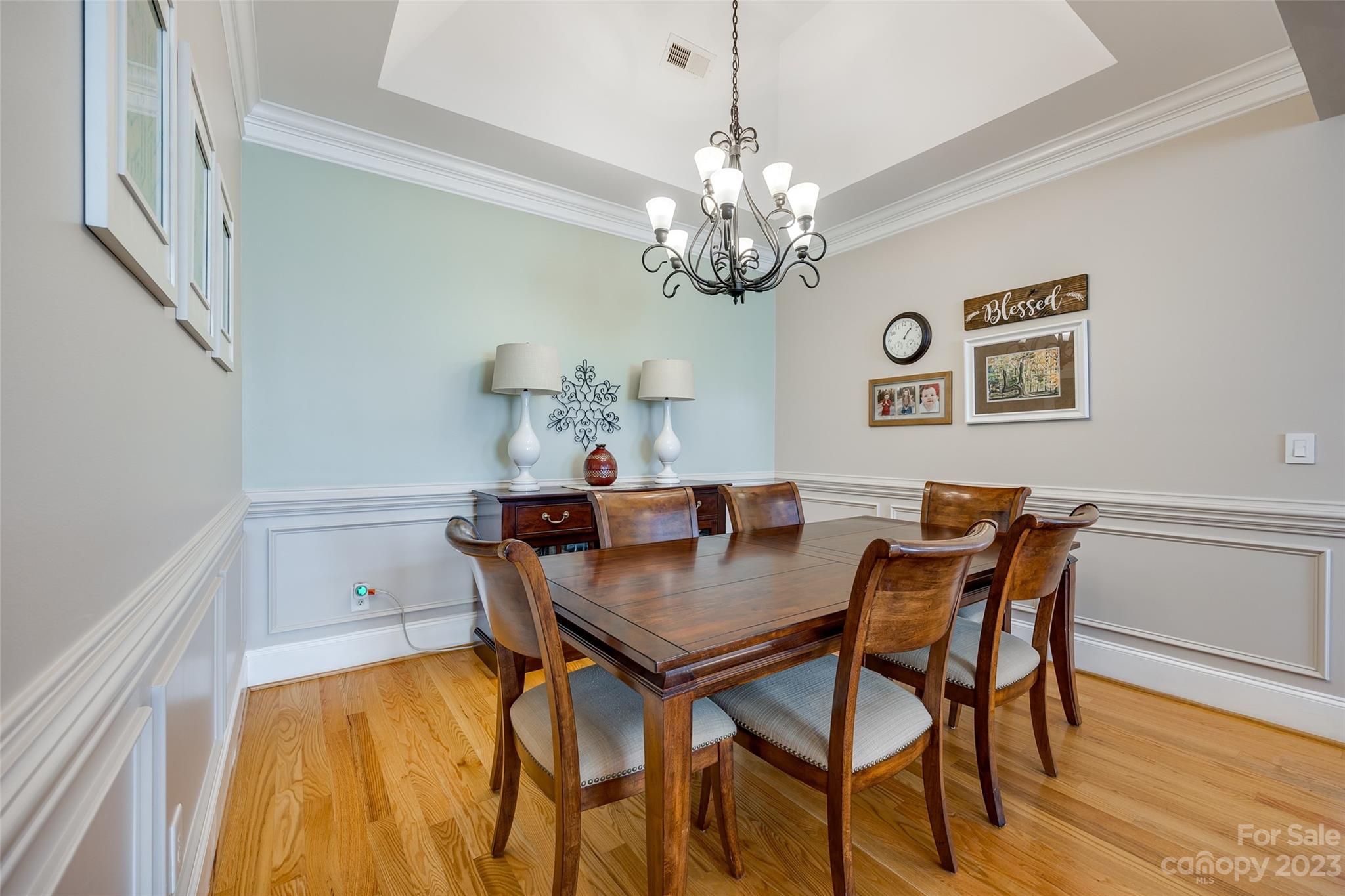 502 Whistling Straits Lane Fort Mill, SC 29708 - Photo 8 of 37 a view of a dining room with furniture and chandelier