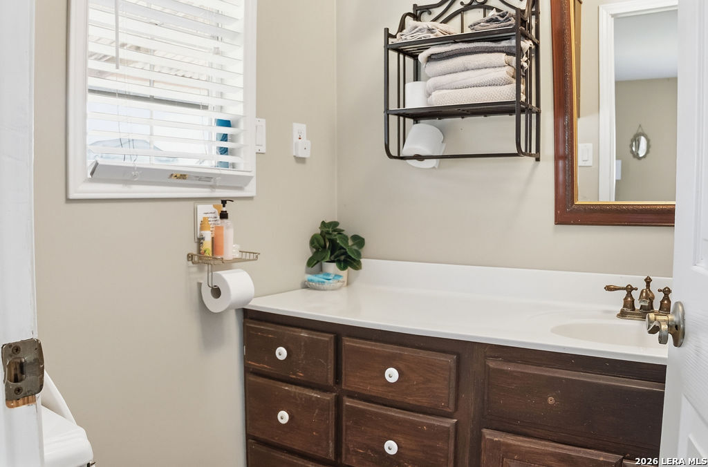 116 Matlock Poth, TX 78147 - Photo 29 of 41 a bathroom with a sink and a mirror