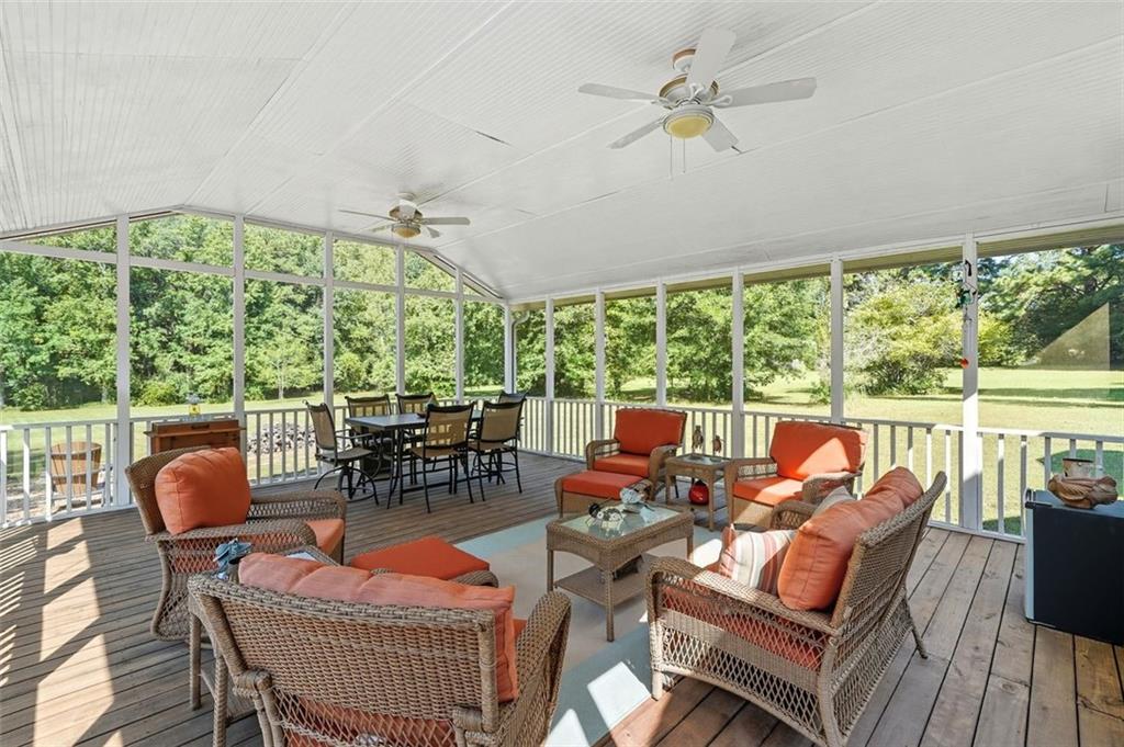 480 Pool Road Hiram, GA 30141 - Photo 11 of 45 a outdoor space with patio the couches and a dining table with garden view