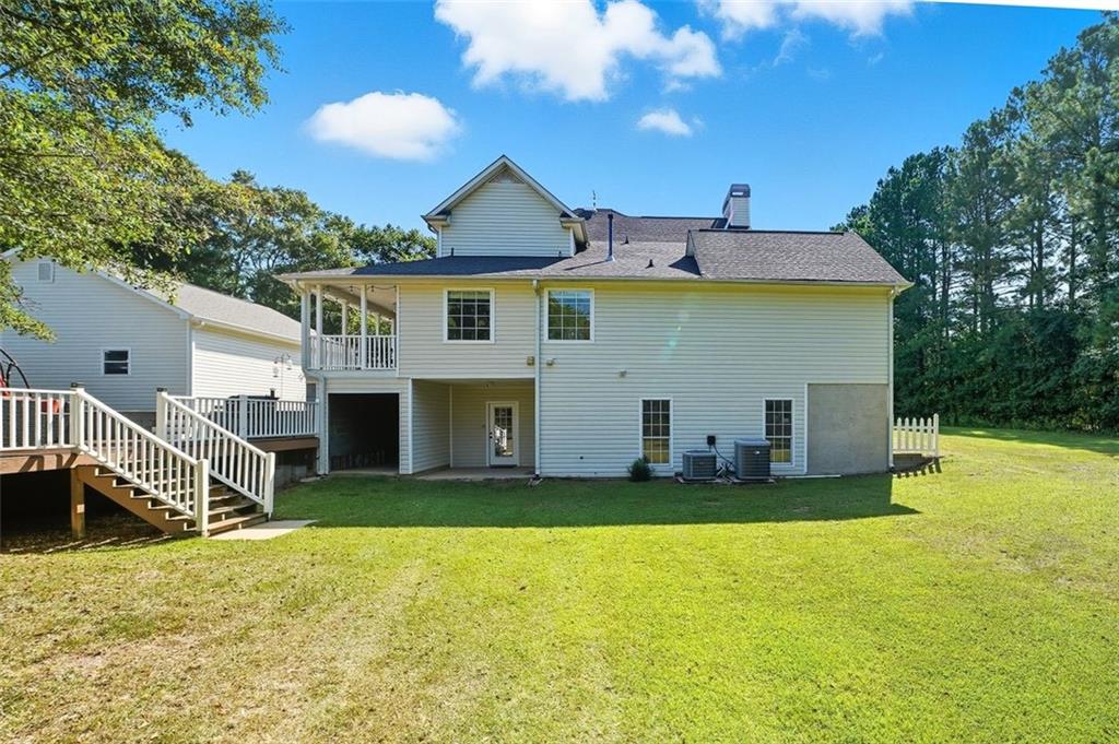 480 Pool Road Hiram, GA 30141 - Photo 14 of 45 a front view of a house with a yard