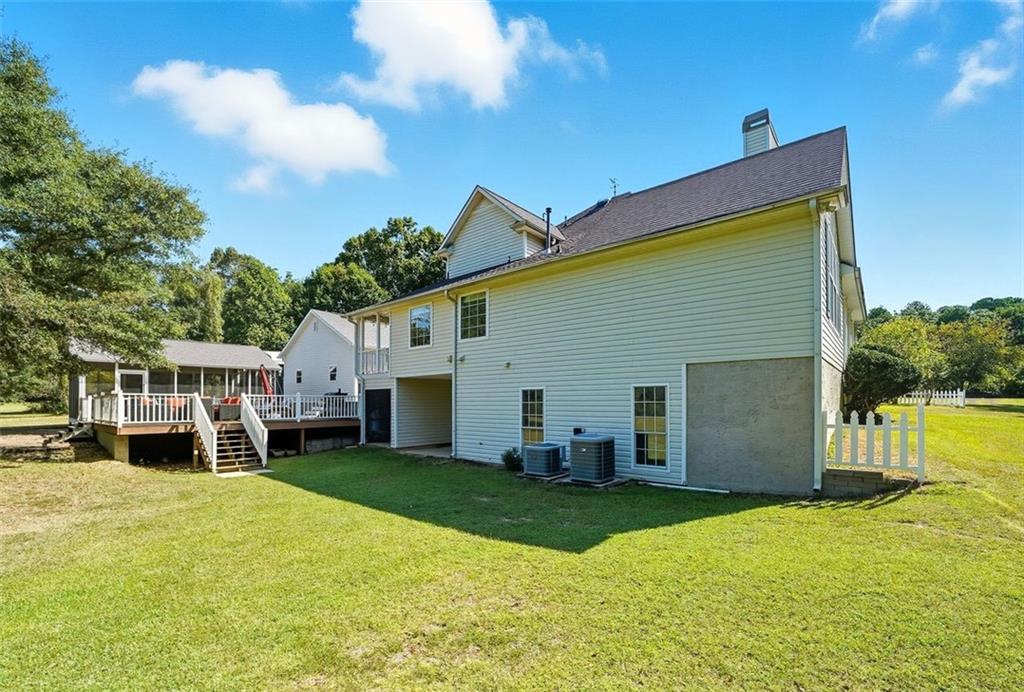 480 Pool Road Hiram, GA 30141 - Photo 15 of 45 a view of a house with a yard patio and fire pit