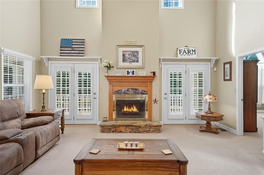 480 Pool Road Hiram, GA 30141 - Photo 22 of 45 a living room with furniture and a fireplace