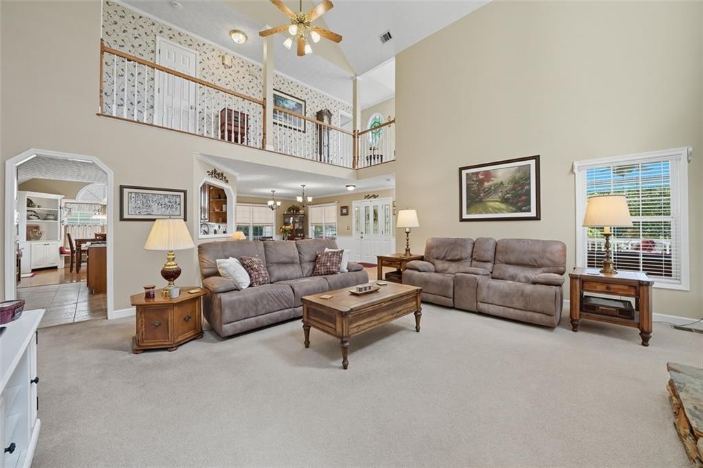 480 Pool Road Hiram, GA 30141 - Photo 23 of 45 a living room with furniture and a table