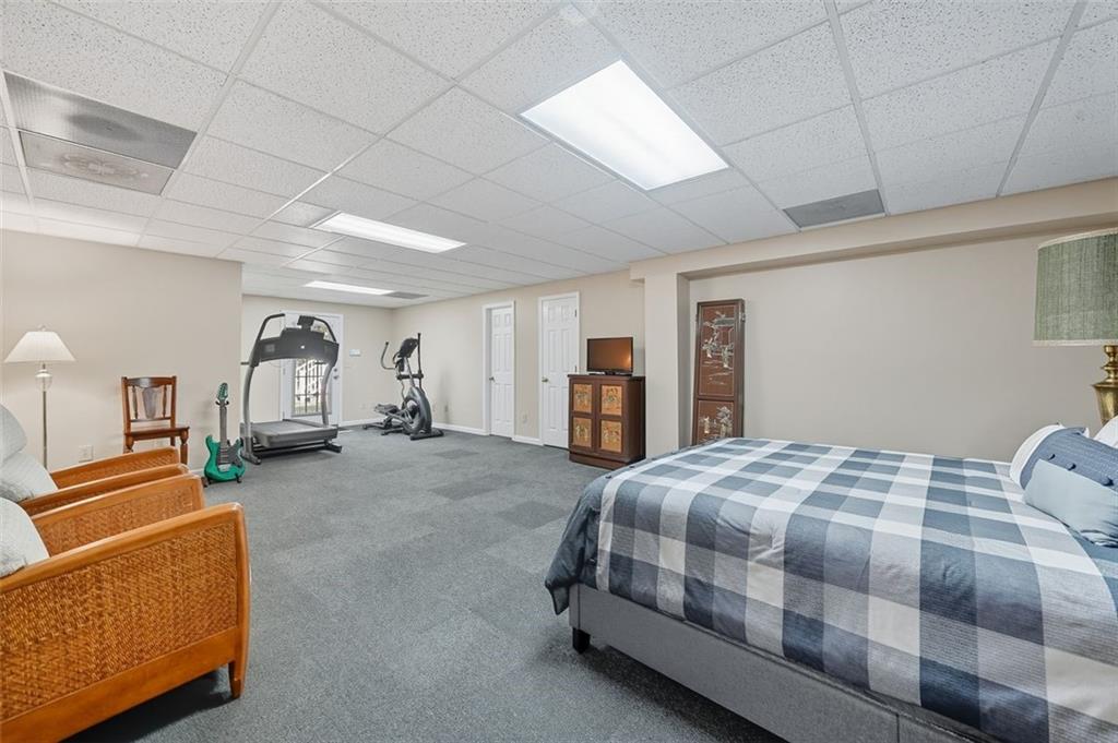 480 Pool Road Hiram, GA 30141 - Photo 38 of 45 a bedroom with a bed and a couch