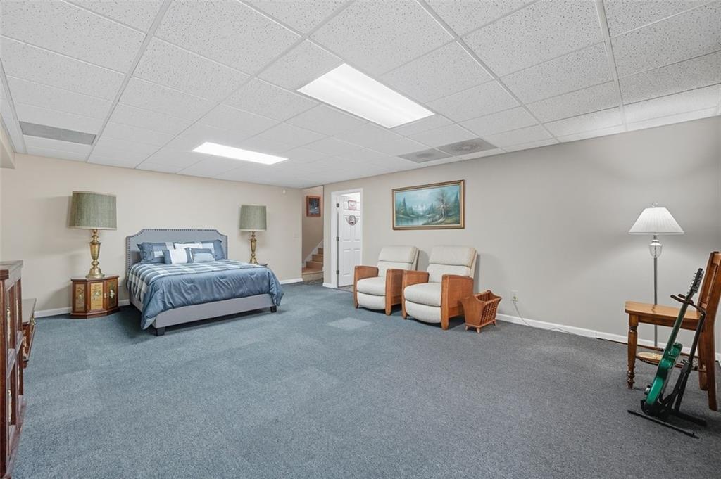 480 Pool Road Hiram, GA 30141 - Photo 39 of 45 a bedroom with furniture and a couch