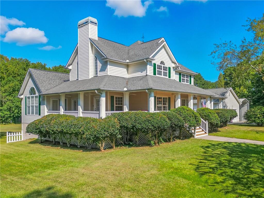 480 Pool Road Hiram, GA 30141 - Photo 5 of 45 a front view of a house with a yard
