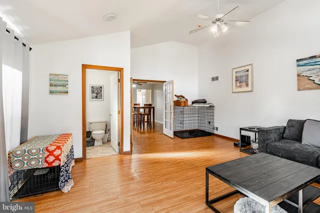 a white toilet sitting next to a bathroom sink