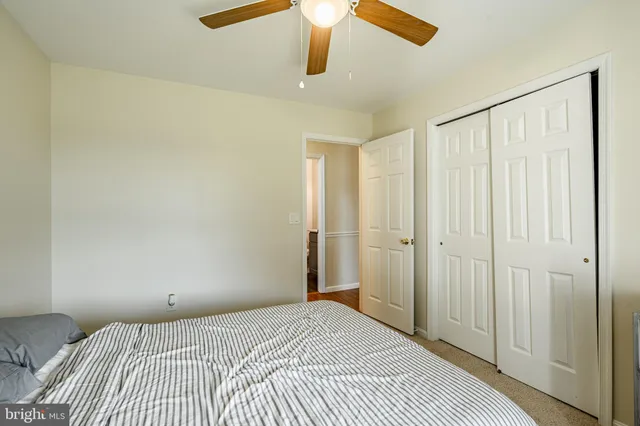 a bathroom with a sink vanity and mirror