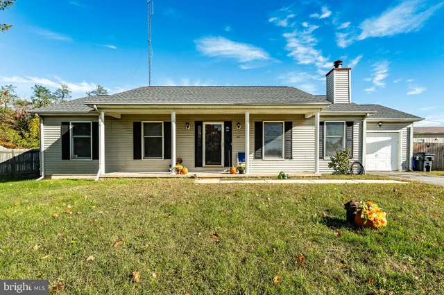 front view of a house with swimming pool