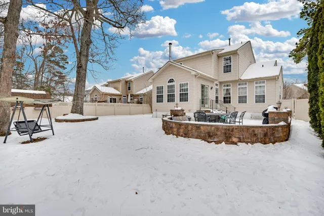 a view of a livingroom with furniture window and wooden floor