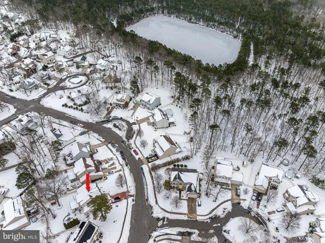 a spacious bedroom with a bed and a couch