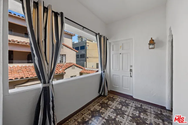 a view of a livingroom with a flat screen tv