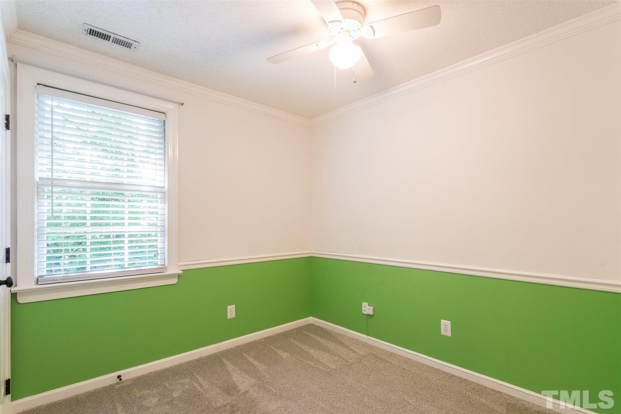4513 Lancashire Drive Raleigh, NC 27613 - Photo 20 of 25 a view of a room with window and stainless steel appliances
