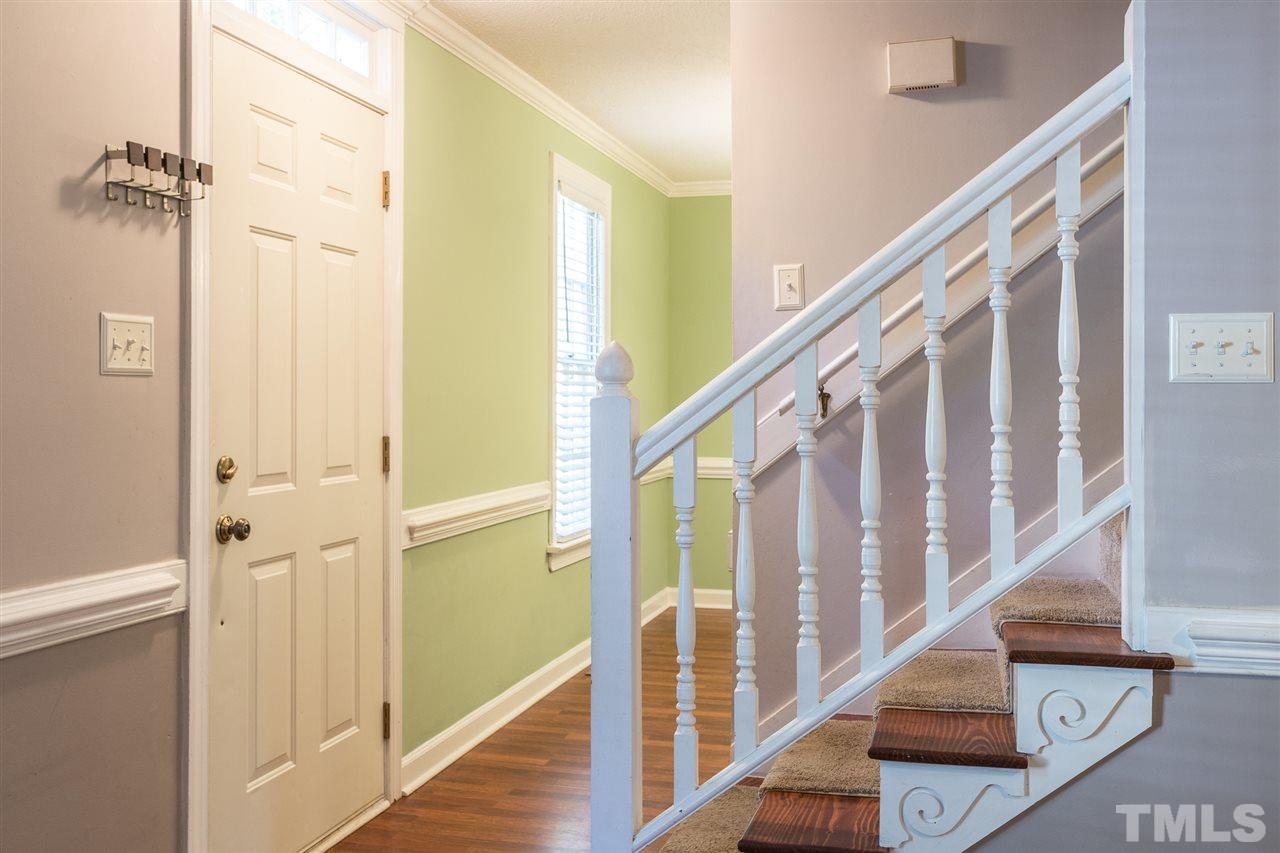 4513 Lancashire Drive Raleigh, NC 27613 - Photo 3 of 25 a view of an entryway with wooden floor