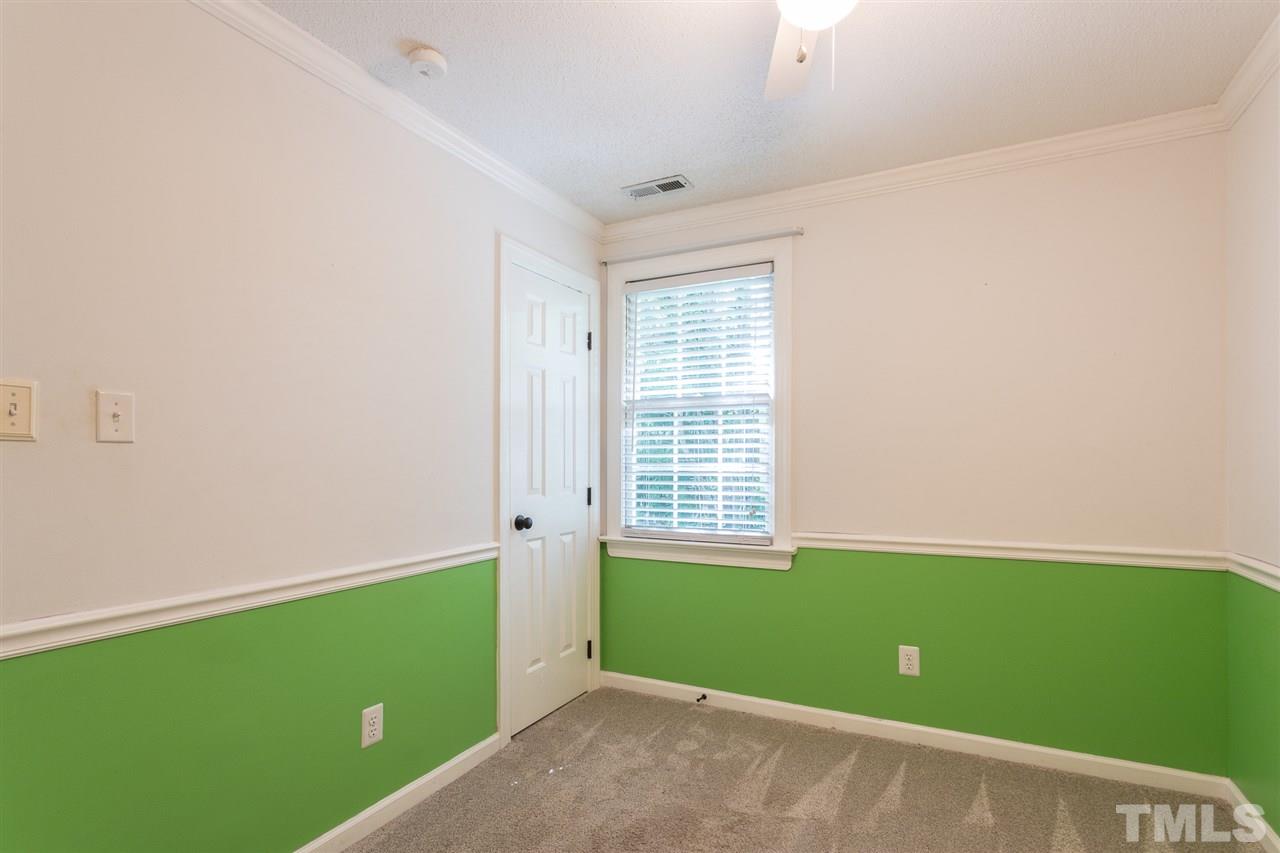 4513 Lancashire Drive Raleigh, NC 27613 - Photo 21 of 25 a view of a room with window