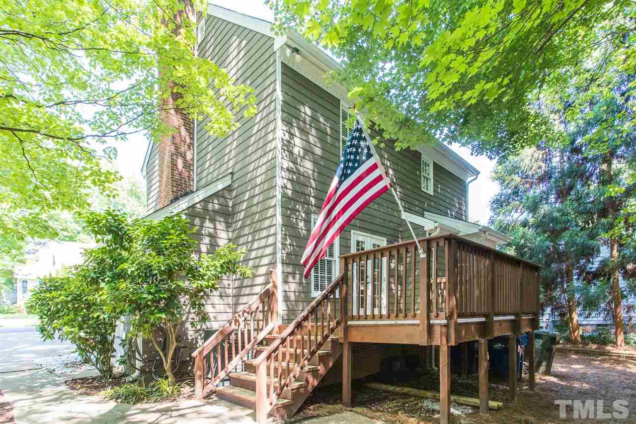 4513 Lancashire Drive Raleigh, NC 27613 - Photo 23 of 25 a front view of a house with a yard